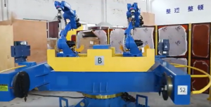 Three axis positioner robotic welding system