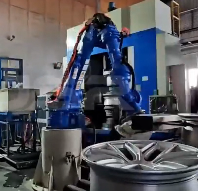 Automated Wheel Rim Handling? Meet Our GP300 Robot in Action